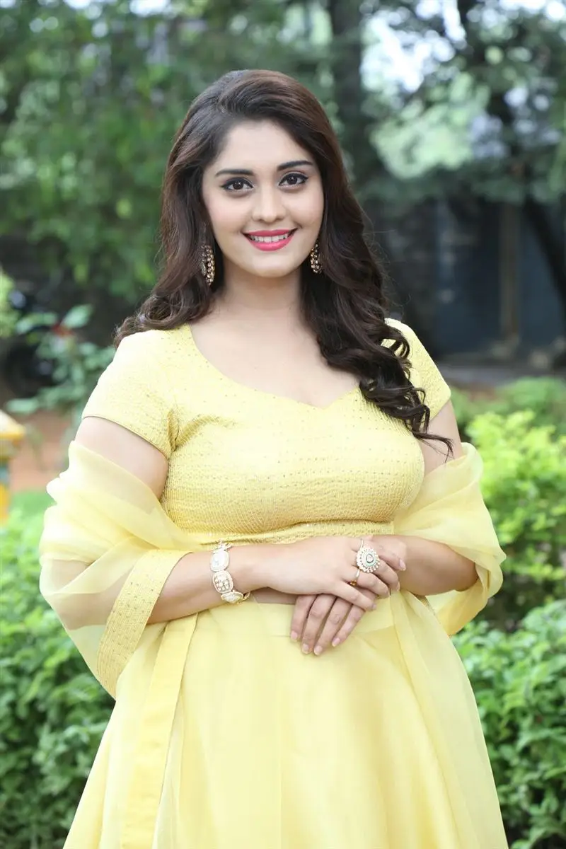 TELUGU GIRL SURBHI PURANIK PHOTOSHOOT IN YELLOW GOWN 5